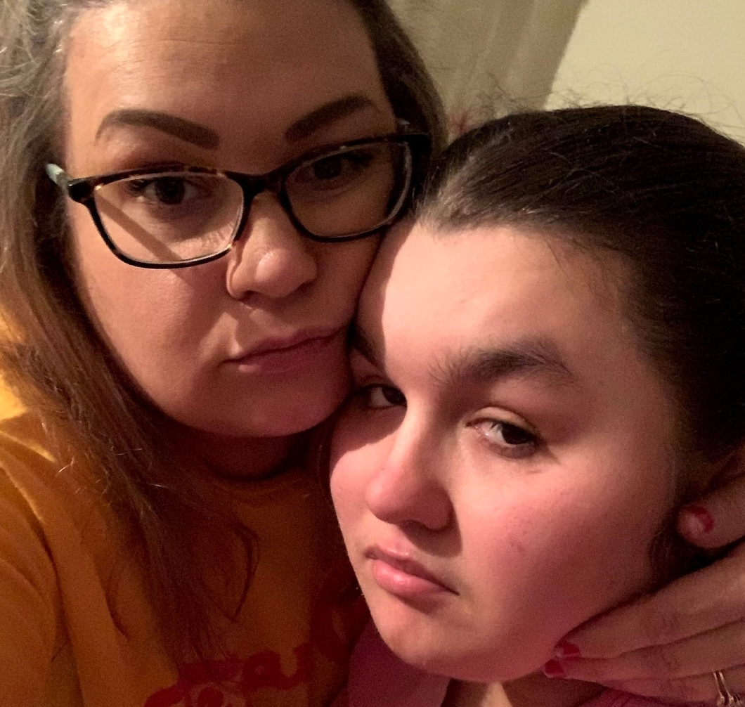  The author comforts her daughter after a challenging day. 