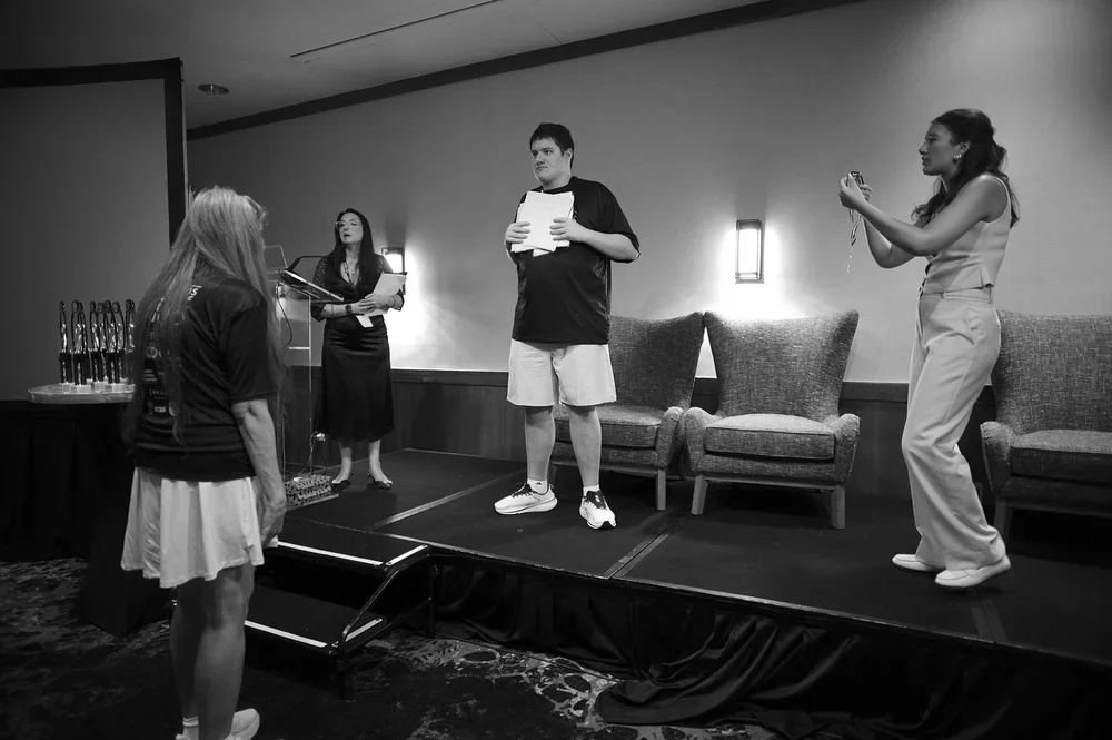 Luke shows the drawings that earn him Artist of the Year.