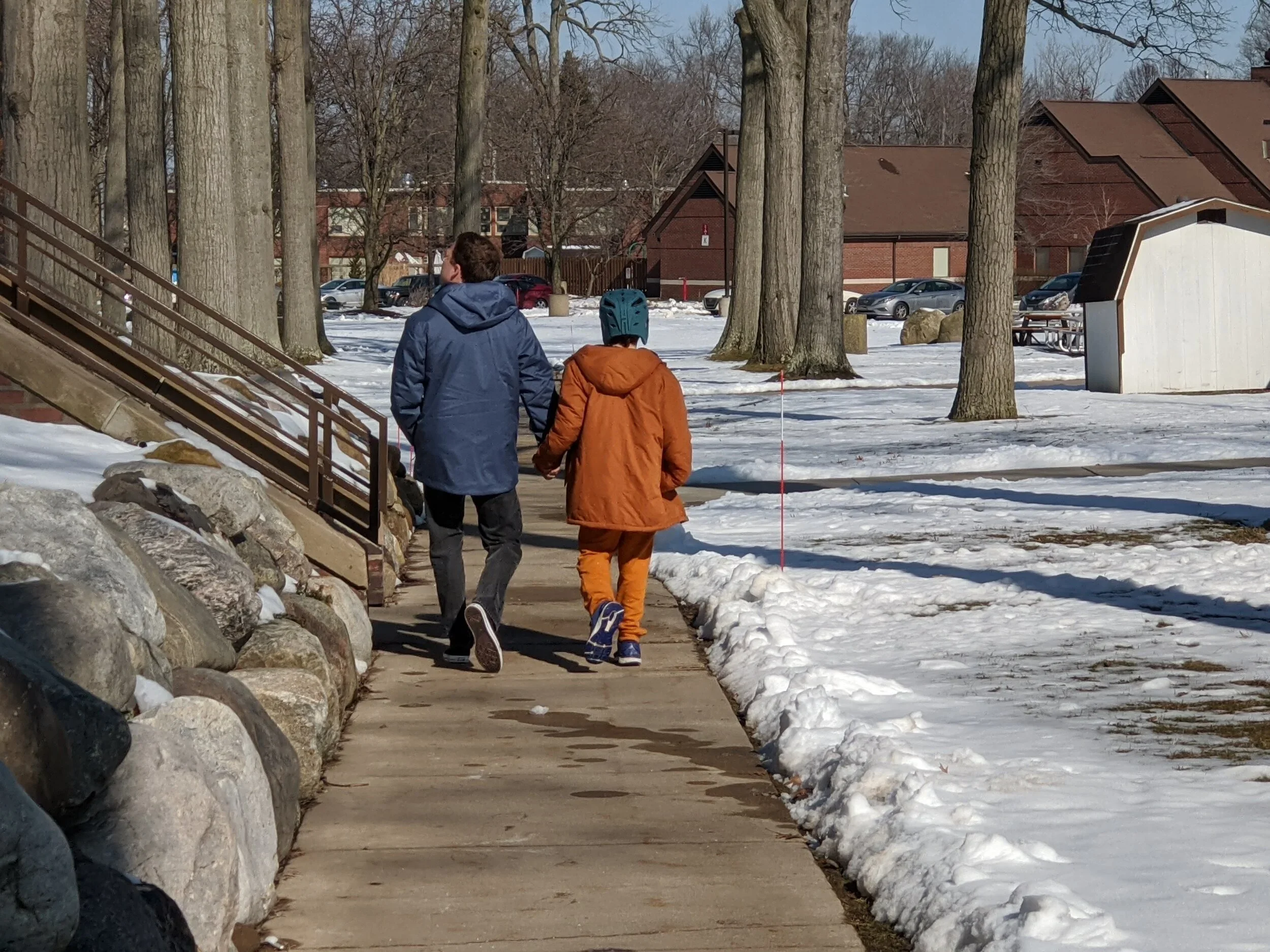  Dad and Wesley walking through his residential campus, out of state, last winter. 