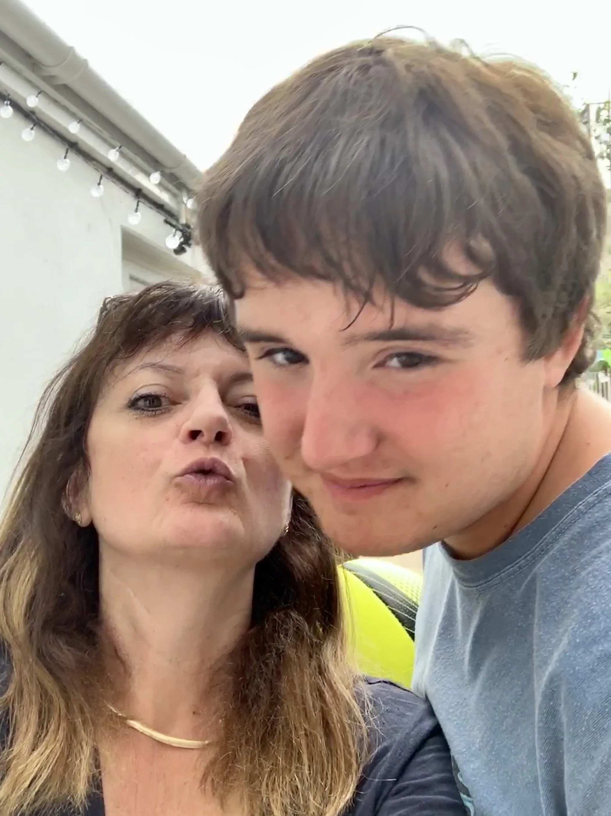  The author with her son Johnny, who is 16, severely autistic, brings pure joy to all who meet him, and will require 24/7/365 care for life. 