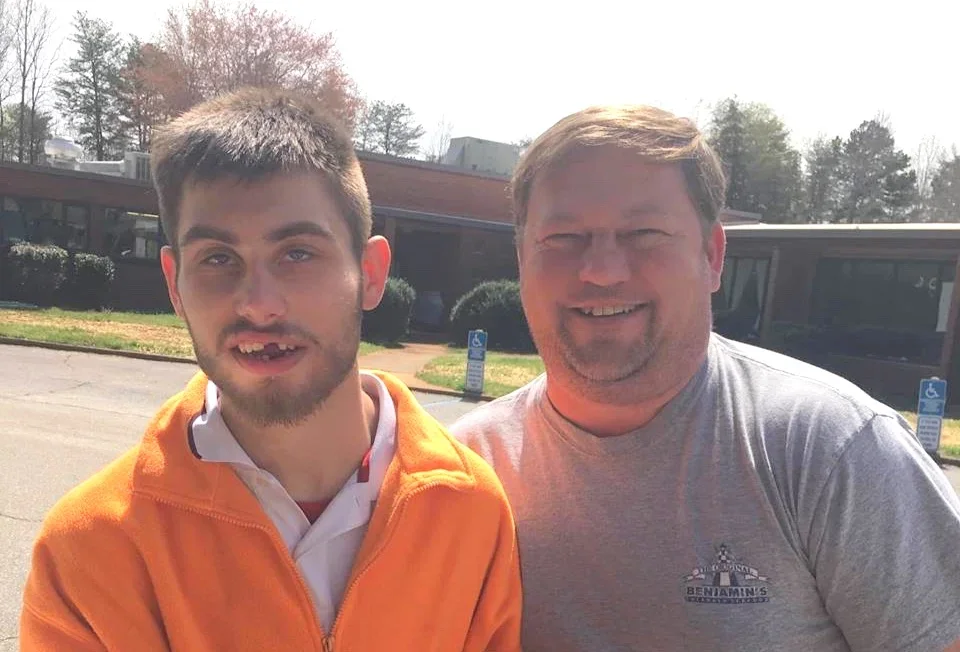  The author, right, visiting with his son Joshua. 