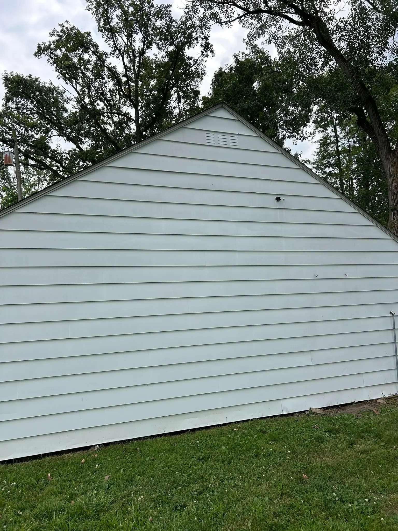 After professional house siding washing