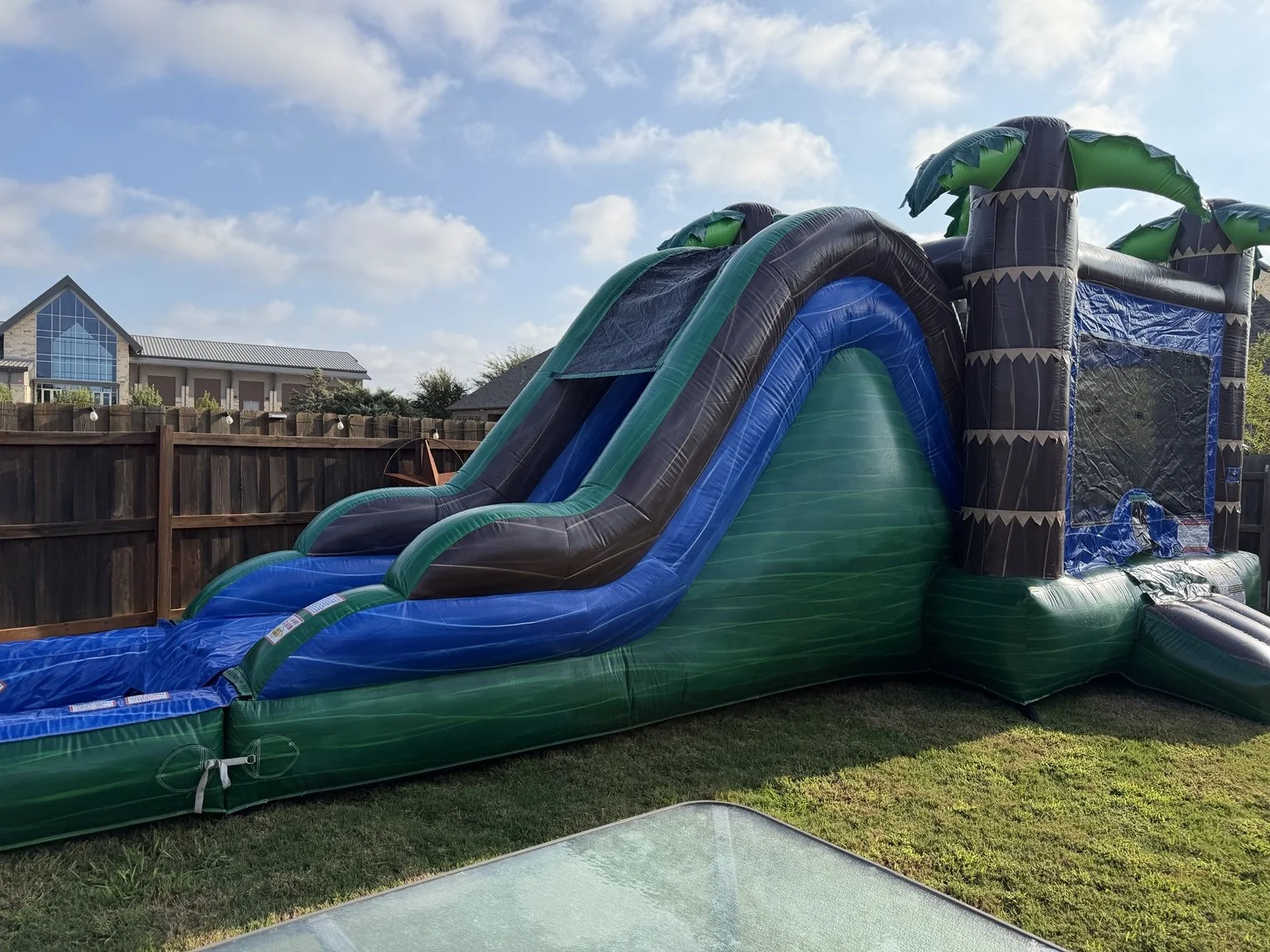 Palm Paradise slide and pool view.