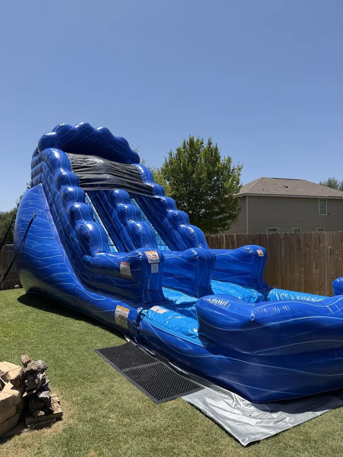 Tidal Wave water slide at an HCCR outdoor party setup.