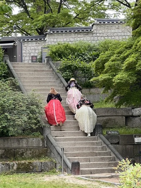Women in hanbok on stairs South Korea