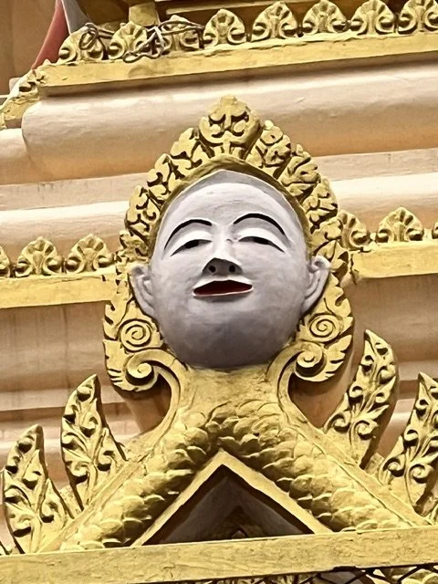 Ornate gold carved temple decoration detail, Cambodia