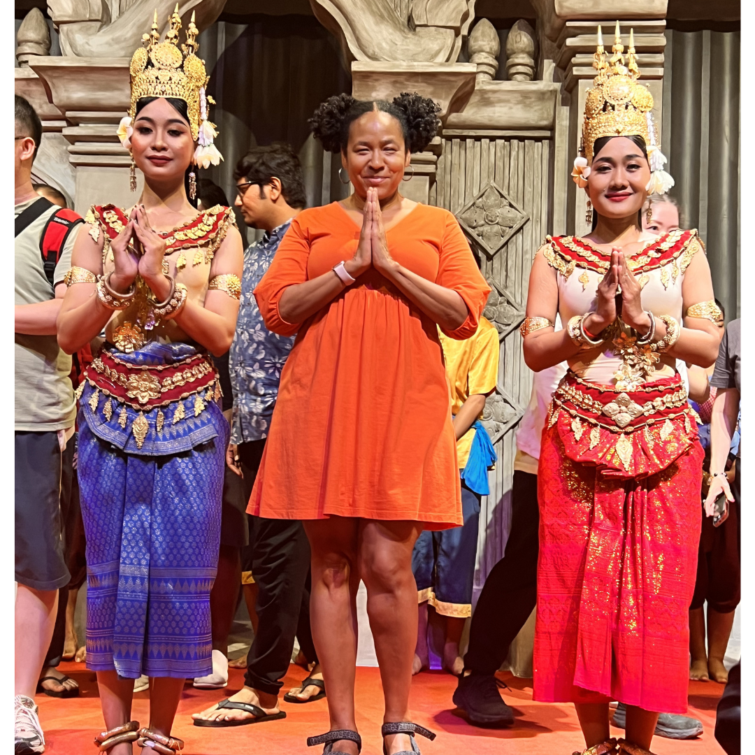 Sondra with traditional Apsara dancers in gold costume, Cambodia