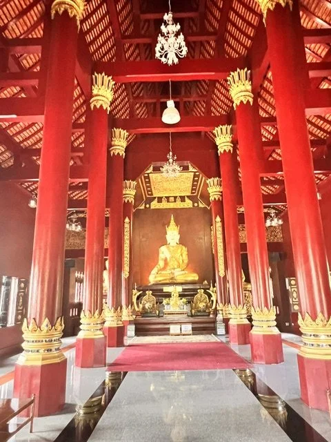 Golden Buddha temple interior Thailand