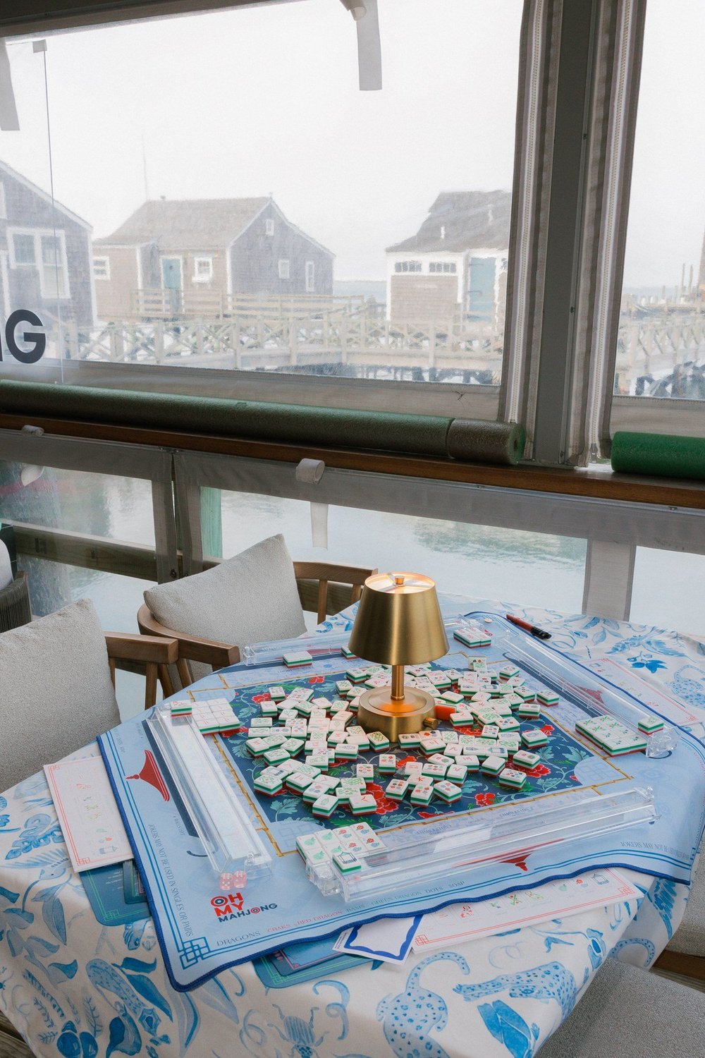 Oh My Mahjong Nantucket mahjong tiles at the table: Nantucket on the Oh My Mahjong Liberty mat · photo: Oh My Mahjong
