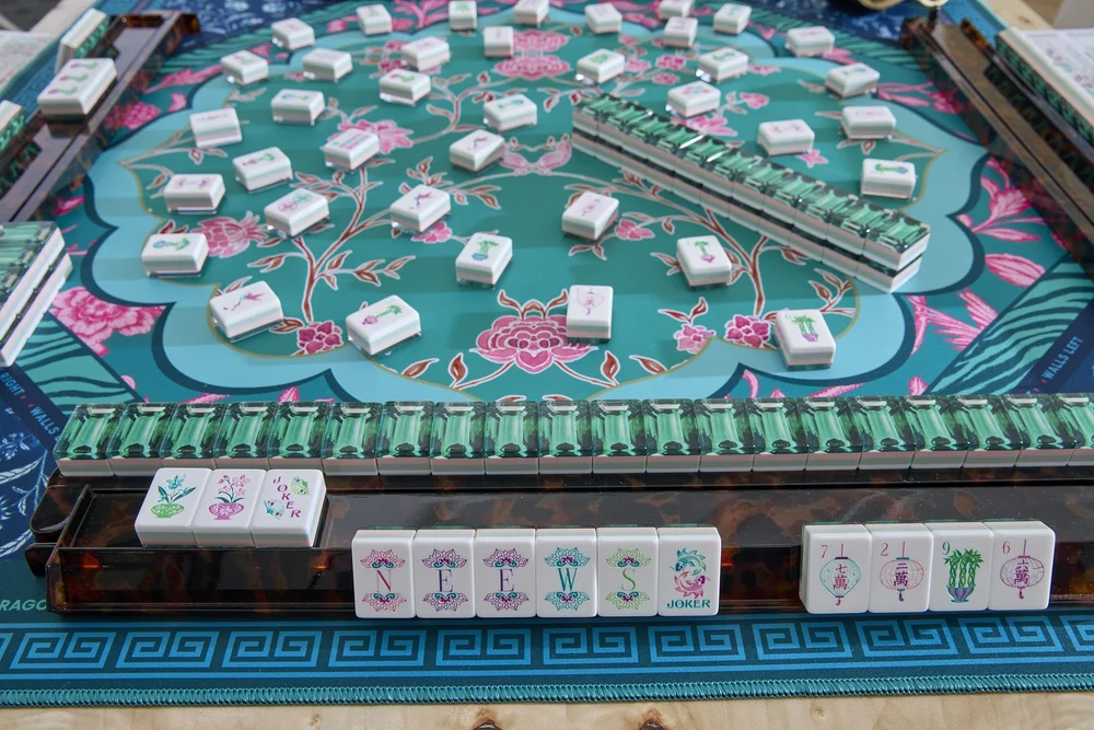 Oh My Mahjong Emerald mahjong tiles at the table: Emerald on the Oh My Mahjong Esme mat · photo: Oh My Mahjong