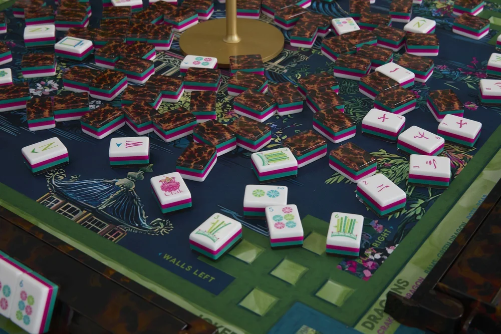 Oh My Mahjong Glow Wild mahjong tiles at the table: Glow Wild on the Oh My Mahjong Elysium mat · photo: Oh My Mahjong
