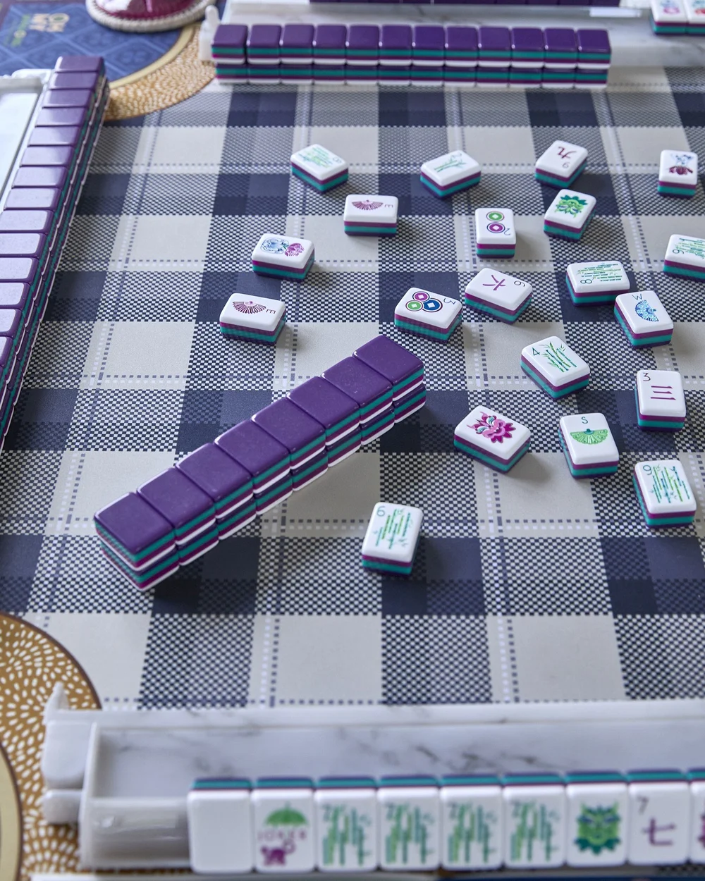 Oh My Mahjong Gemma mahjong tiles at the table: Gemma on the Oh My Mahjong Vanderbilt mat · photo: Oh My Mahjong