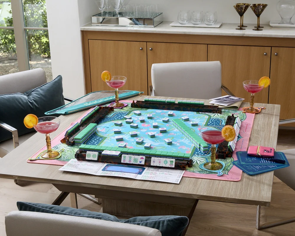 Oh My Mahjong Jasmine mahjong tiles at the table: Jasmine on the Oh My Mahjong Serengeti mat · photo: Oh My Mahjong