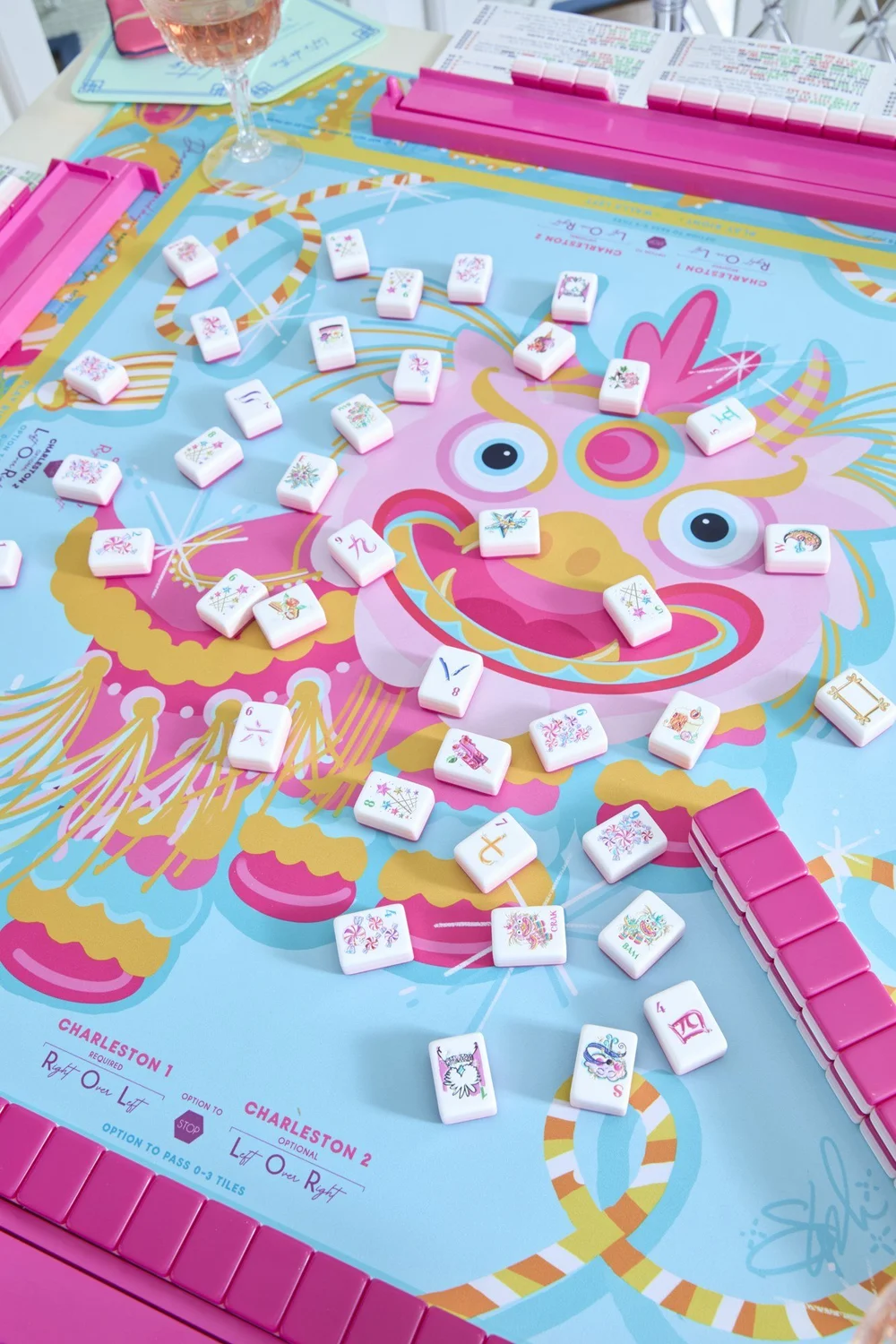 Oh My Mahjong Glitterville mahjong tiles at the table: Glitterville on the Oh My Mahjong Glitterville Dragon mat · photo: Oh My Mahjong