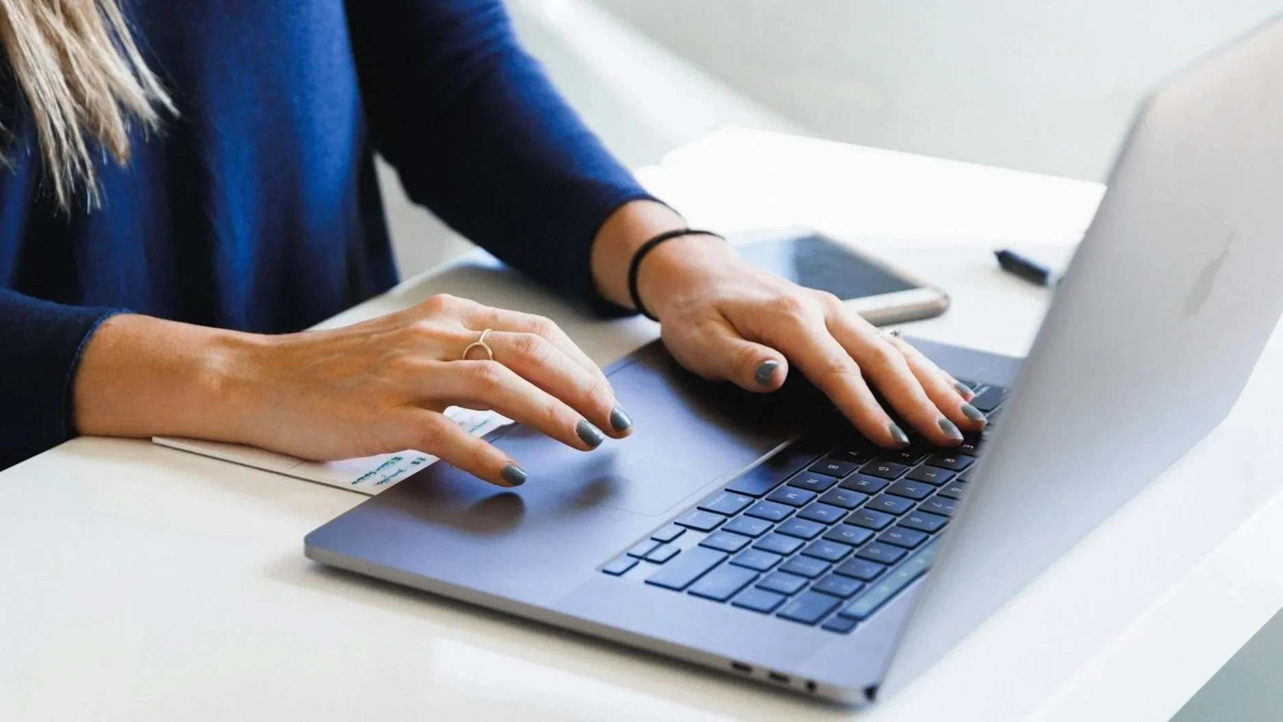 Transcriptionist working at a laptop