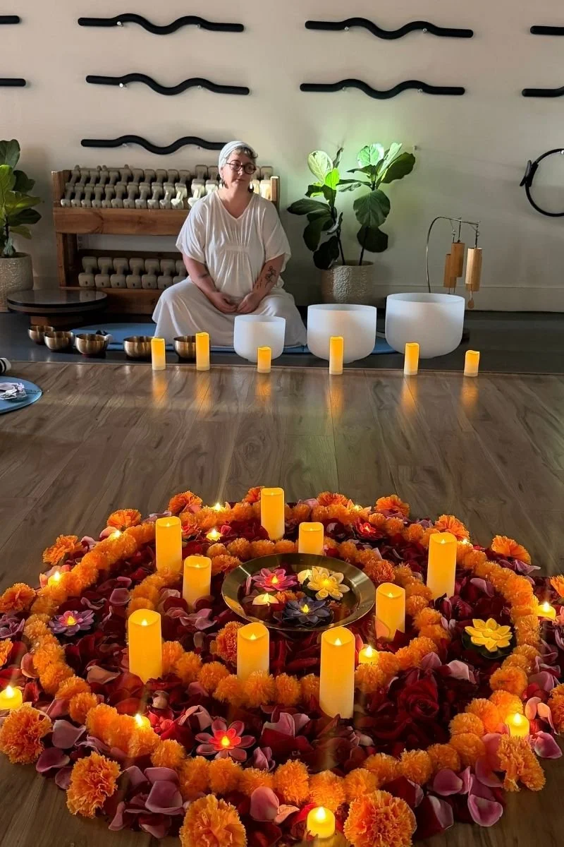 Crystal and bronze singing bowls set up for a private sound bath in Overland Park.