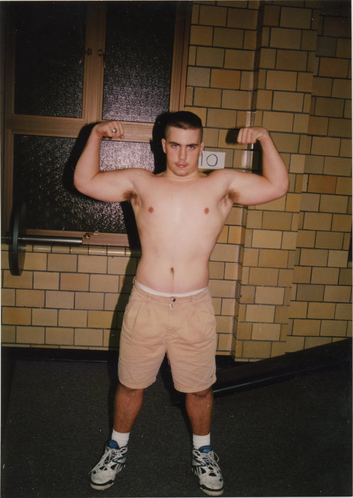 Archival photograph, frontal flex with handwritten 10