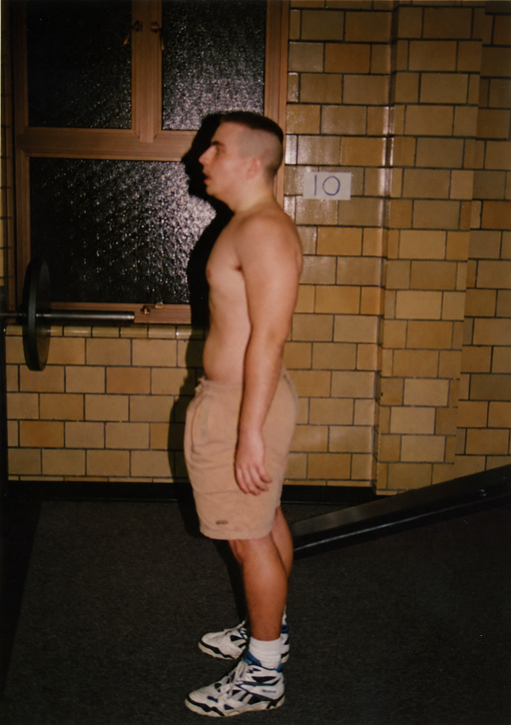 Archival photograph, side profile with handwritten 10