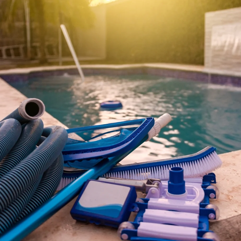 new variable-speed pool pump installed beside filter system