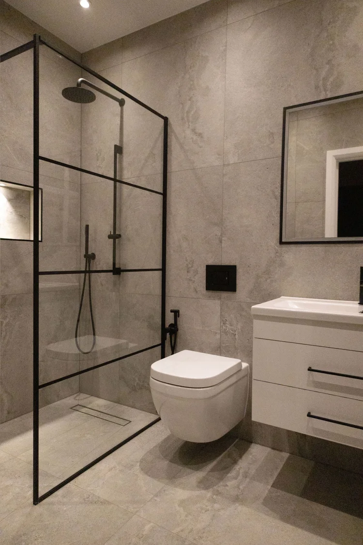 Shower room in Morden by RELM Interiors