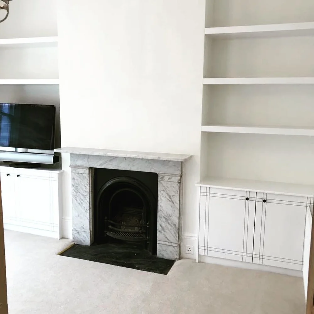 Alcove shelving and cupboards in Putney