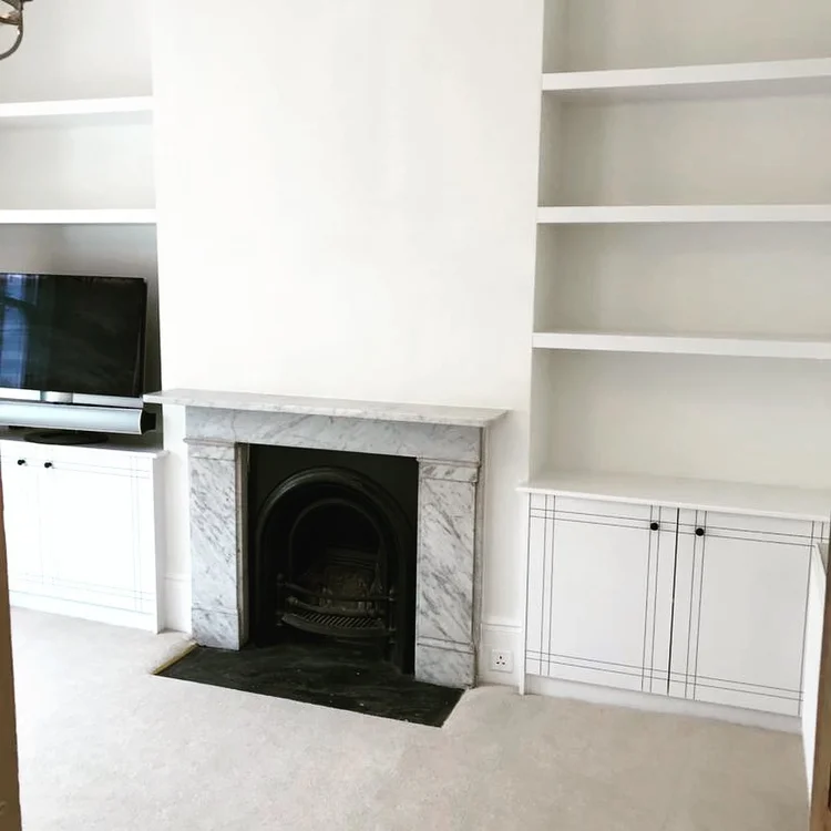 Alcove shelving & cupboards in Putney by RELM Interiors