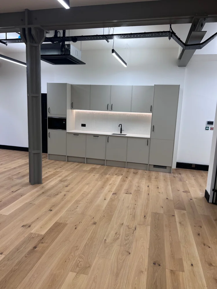 Office kitchenette in London by RELM Interiors
