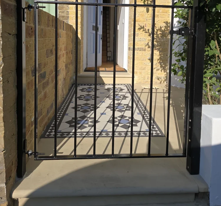 Front patio restoration in Barnes by RELM Interiors