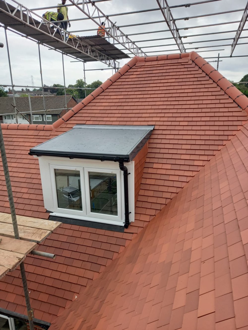 New dormer finished in red clay tiles on a Wimbledon house
