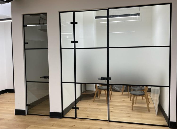 Industrial-style office in Old Street by RELM Interiors