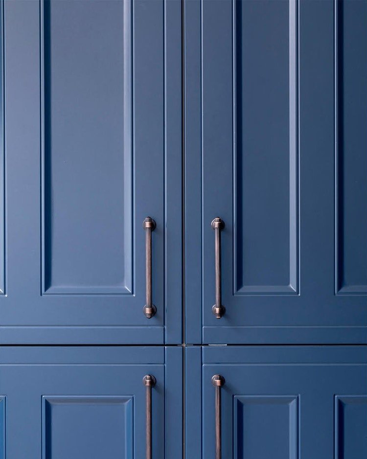 Kitchen cabinets by RELM Interiors