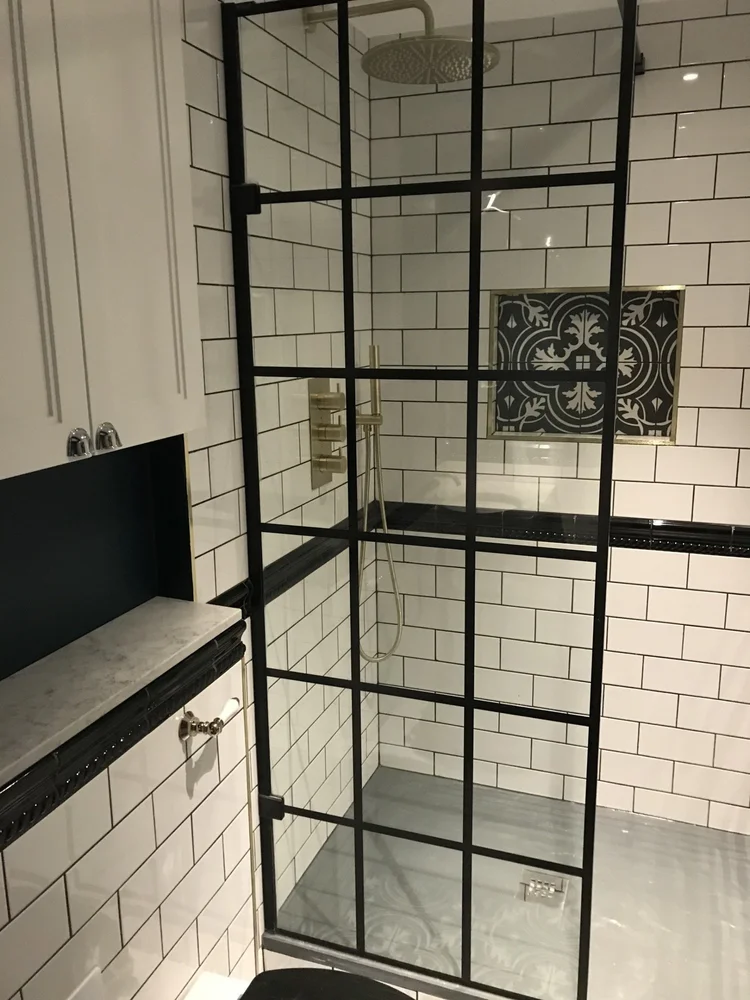 Bedroom to shower room in Putney by RELM Interiors
