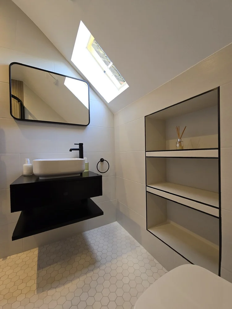 En suite shower room by RELM Interiors