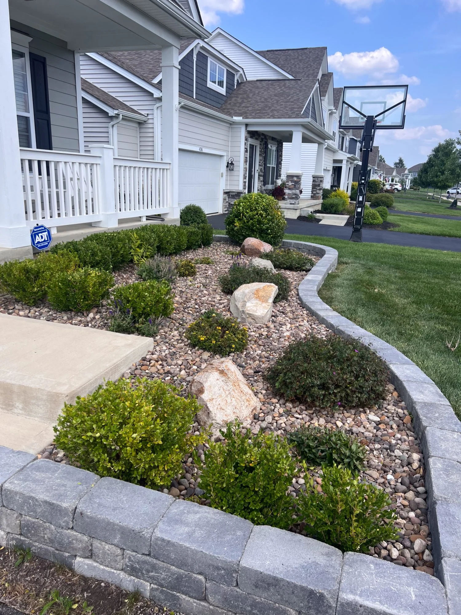 Landscape curbing and paver retaining wall