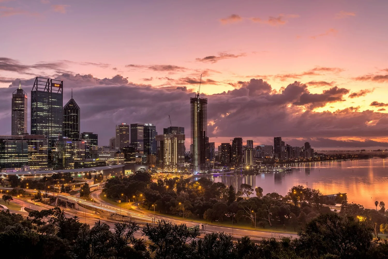 The Perth city skyline and the Swan River at dusk