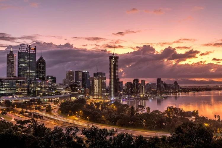 The Perth city skyline and the Swan River at dusk
