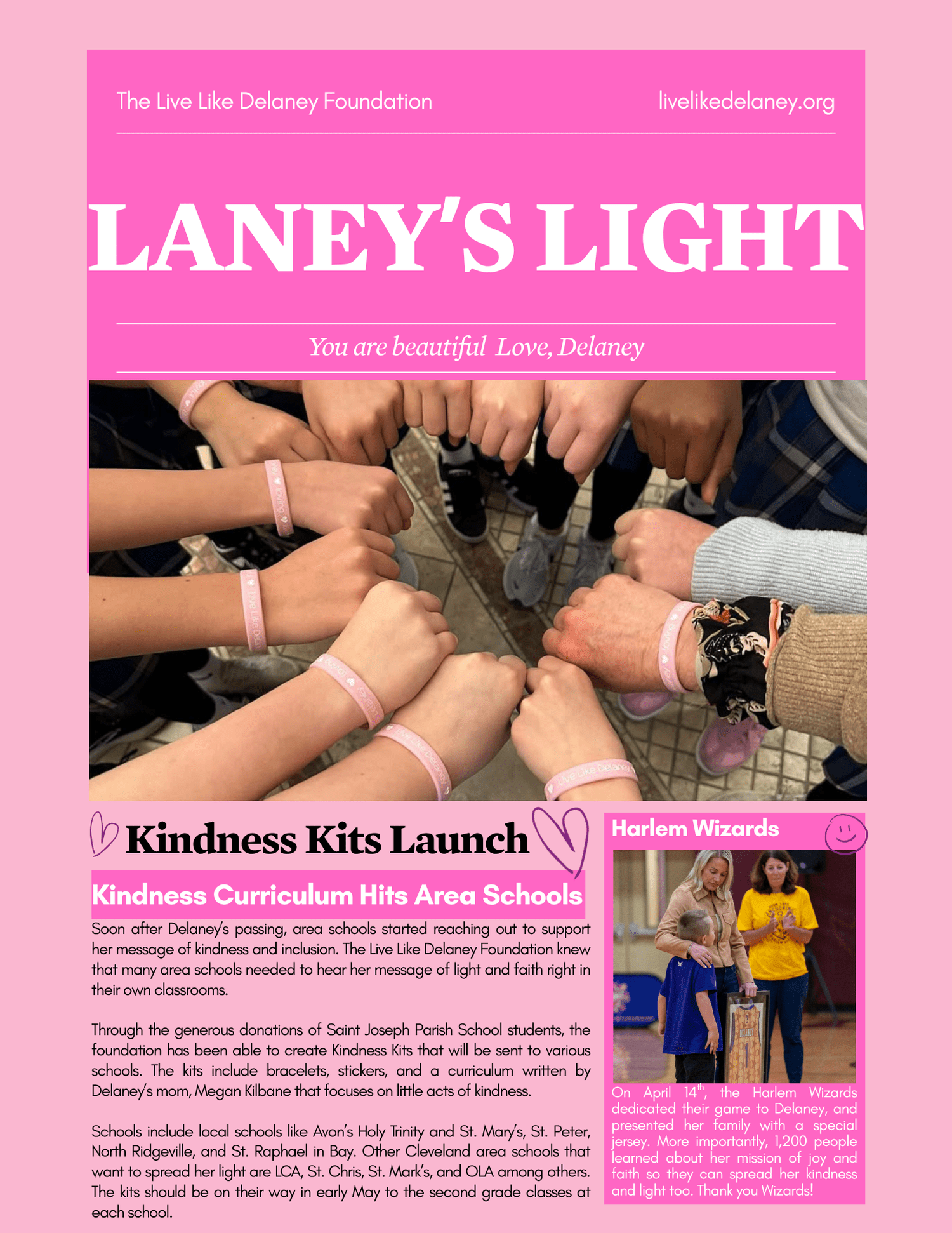 A circle of hands in fists, each wrist wearing a pink Live Like Delaney bracelet