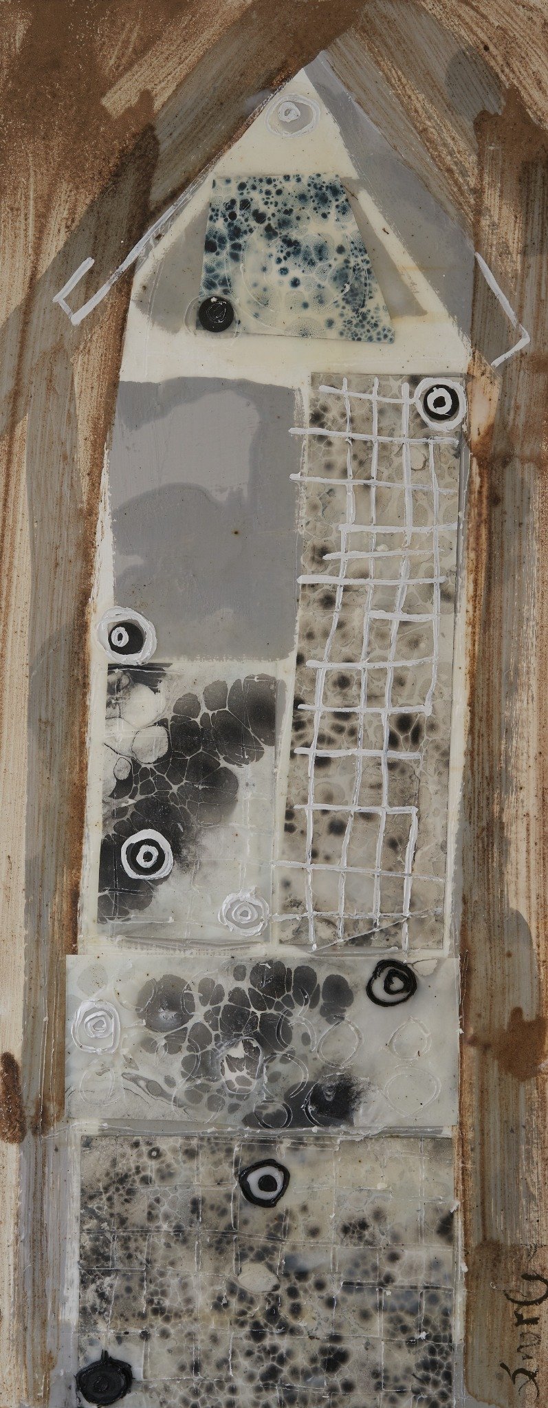 Insect Hotels by Erin McGee Ferrell. A narrow house form with a pointed roof and dark circular marks.