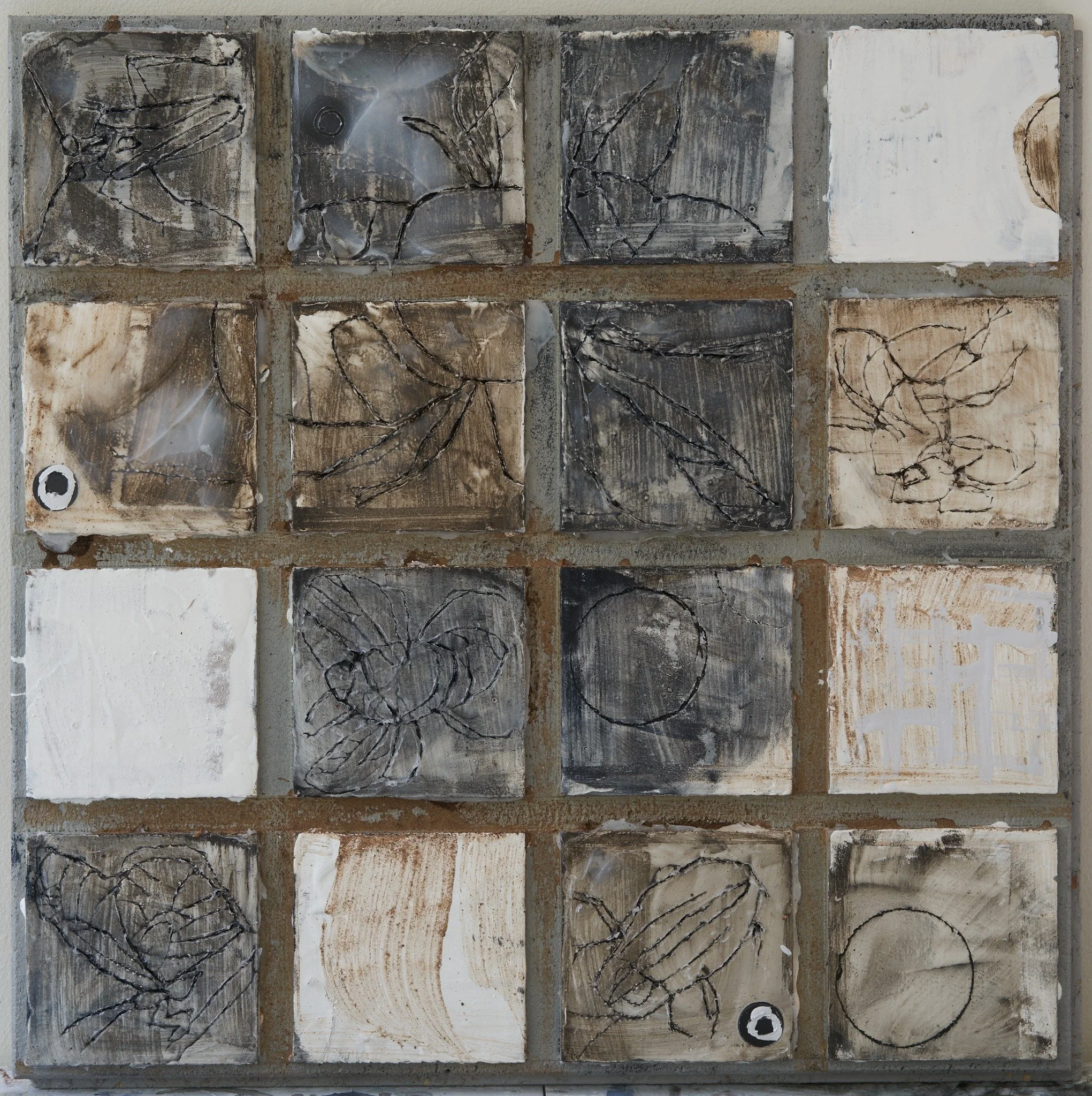 Insect Hotels by Erin McGee Ferrell. A grid of dark and pale compartments with looping drawn lines.