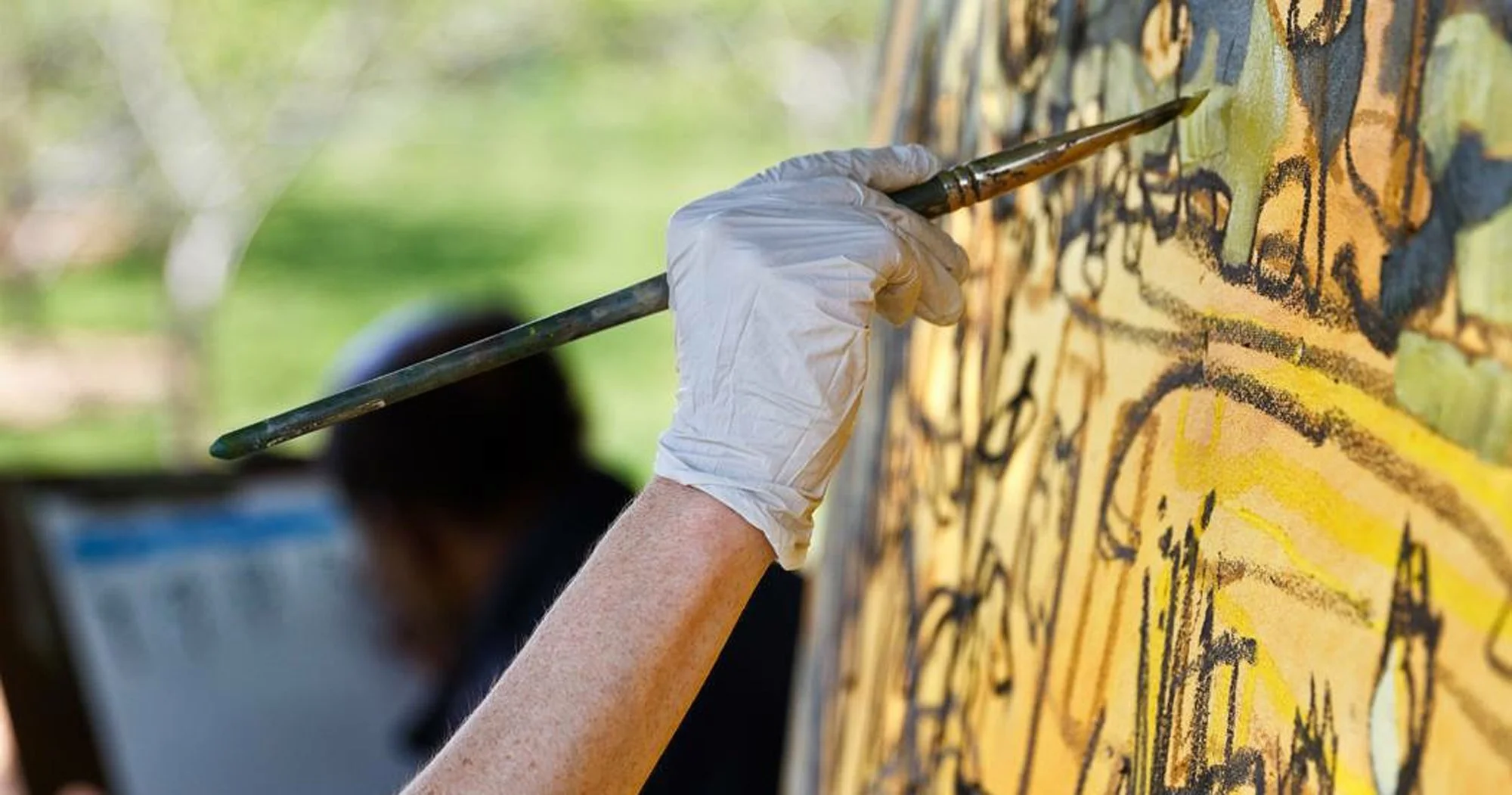 Brushwork on location. Photograph: Adam Birt.