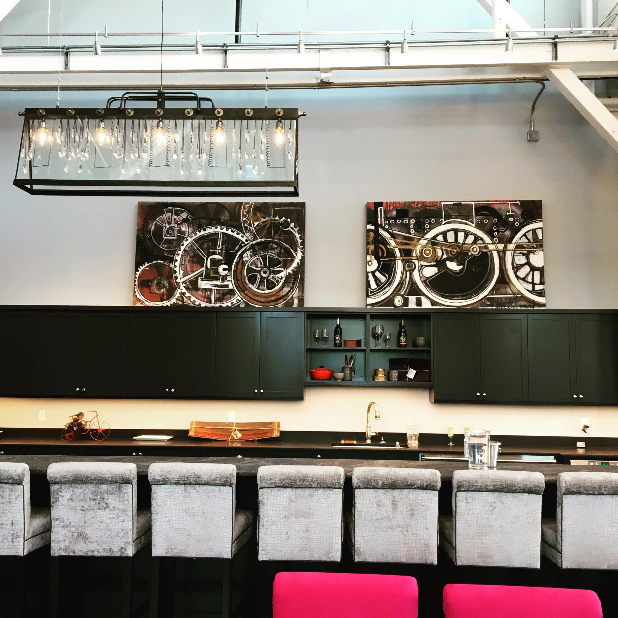 Both Erin McGee Ferrell paintings installed above the bar in Cellardoor Winery’s original Thompson’s Point Portland showroom