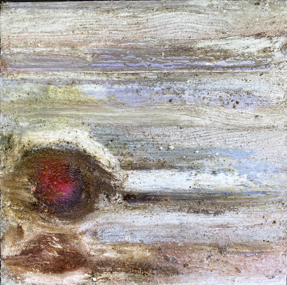Cream and lavender atmospheric bands around a dark red swirl