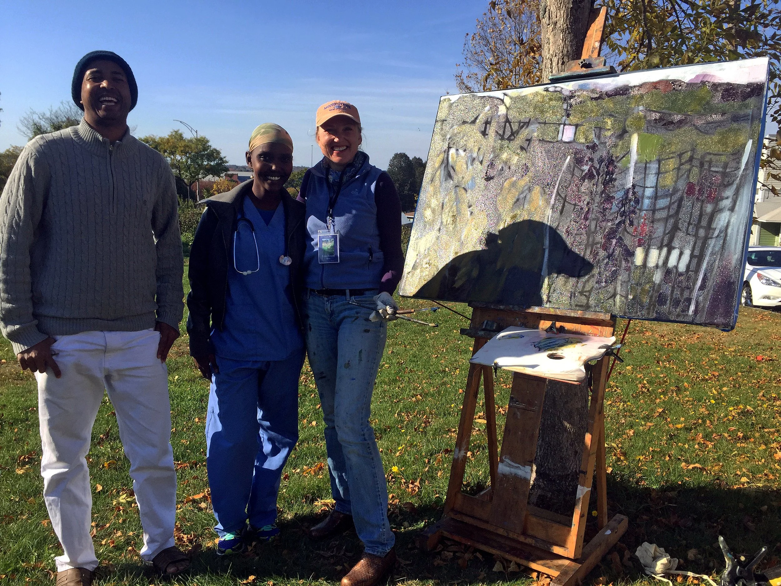 Community visit during the garden painting project.