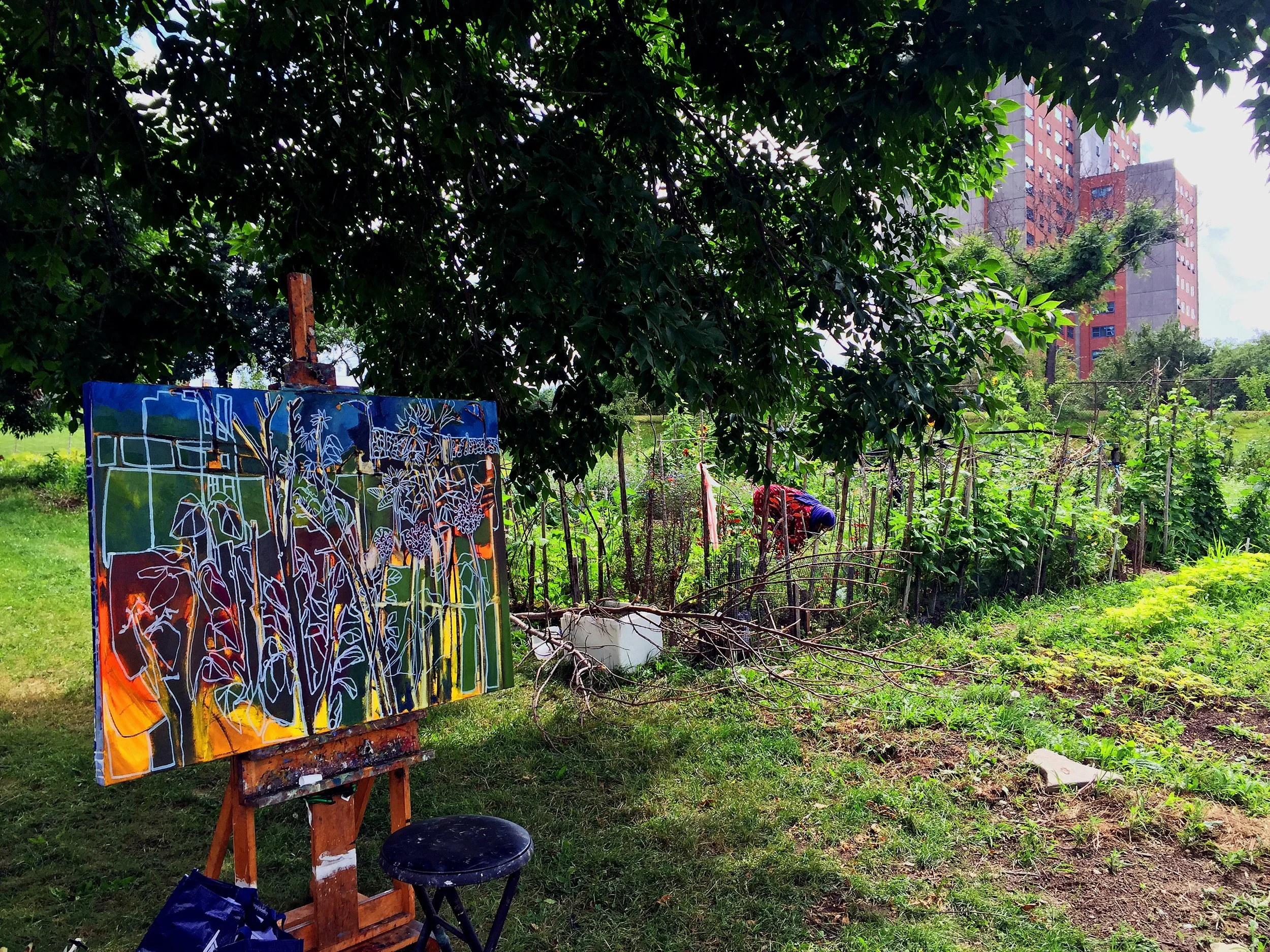 Painting on location at the community garden.