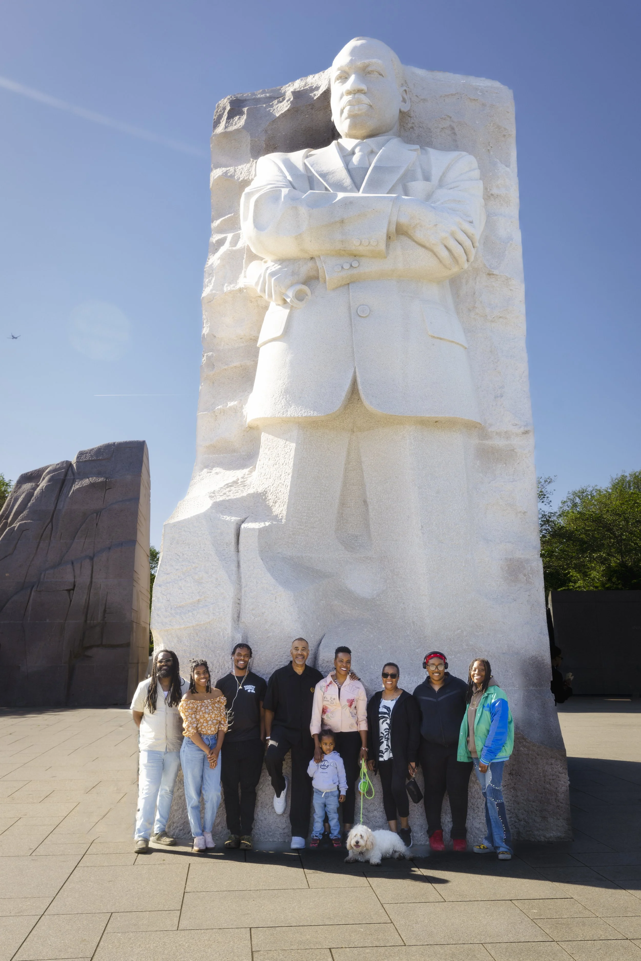 Community group portrait at the Martin Luther King Jr. Memorial Stone of Hope, Tidal Basin Washington, DC. Central Photo Company