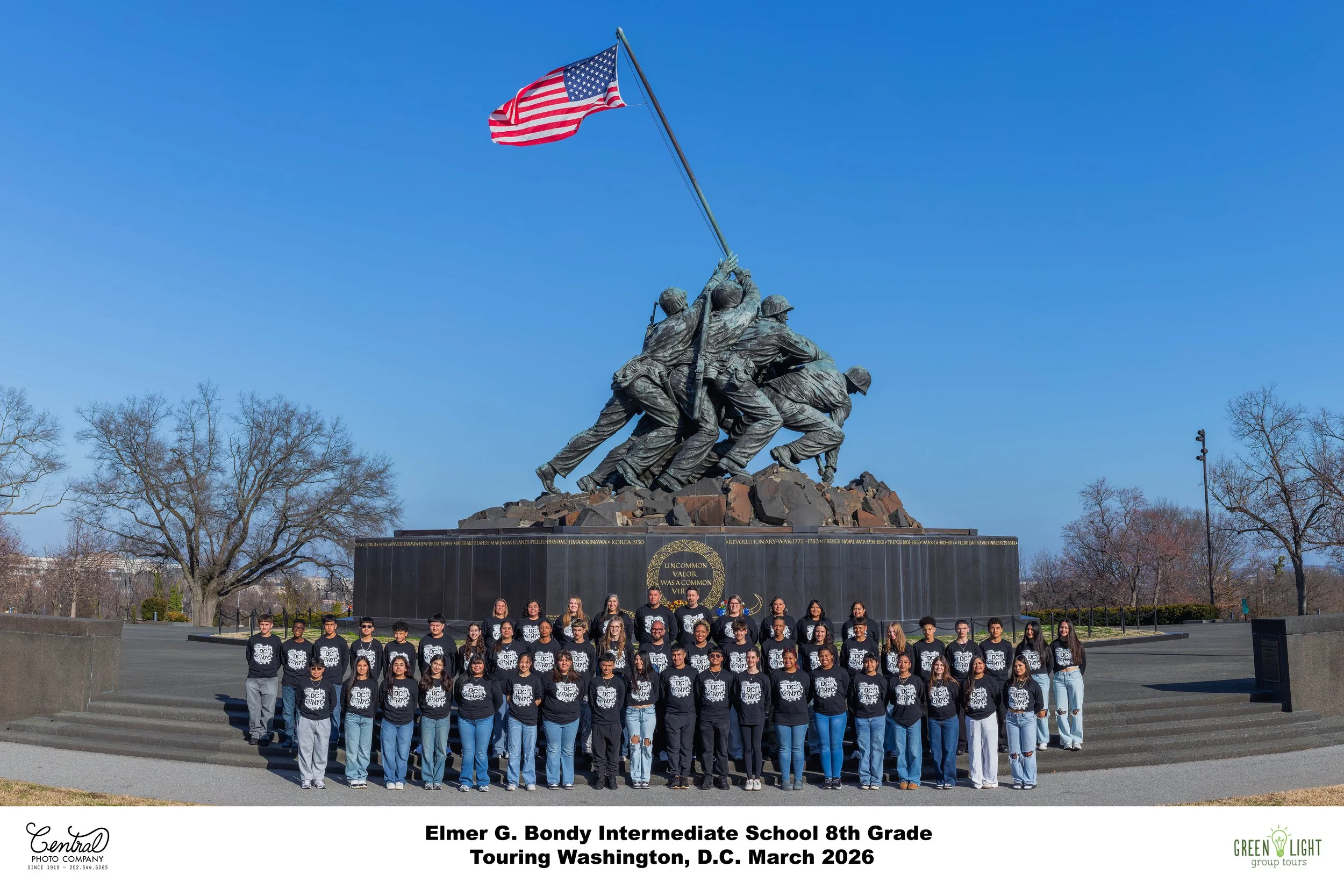 Military veteran group panoramic portrait at the U.S. Marine Corps War Memorial Iwo Jima statue, Arlington Virginia. Central Photo Company