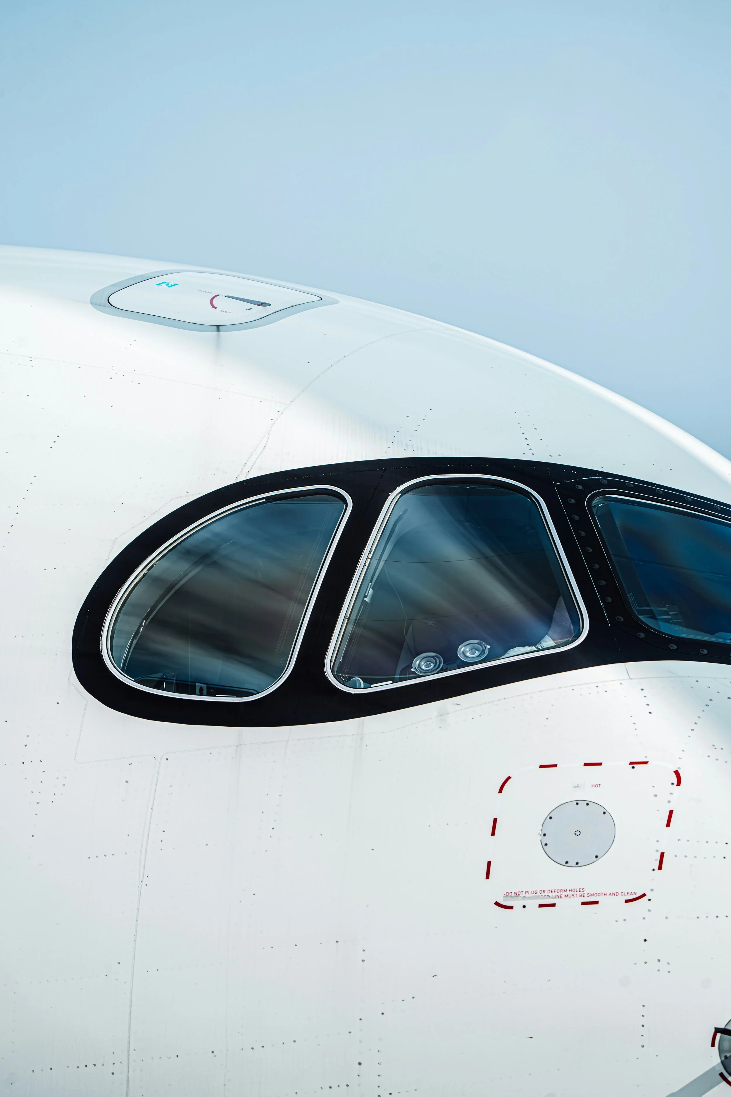 An Airbus A320 family aircraft at an airport.