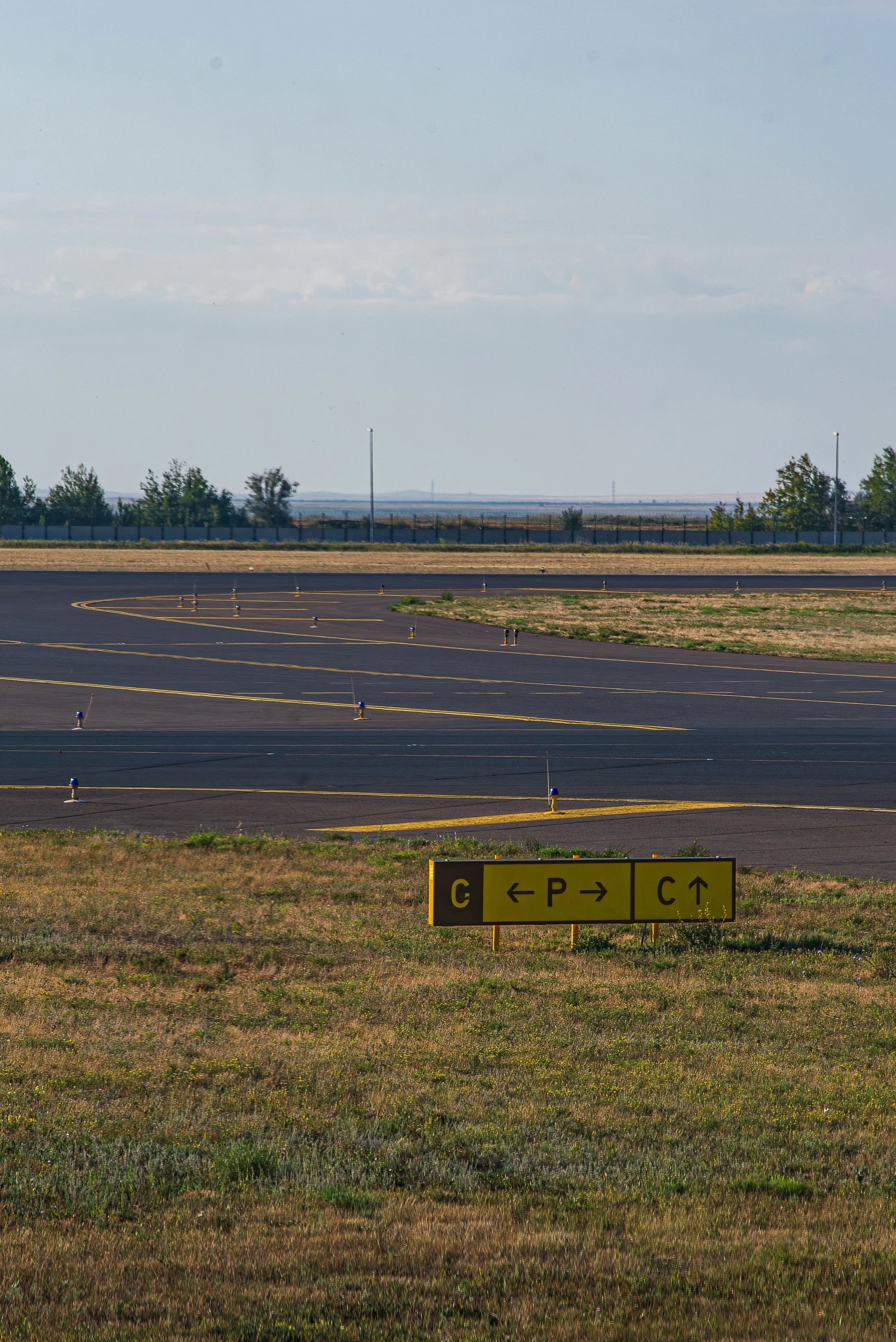 Airport control tower and passenger aircraft representing Erasmus+ aviation programmes.