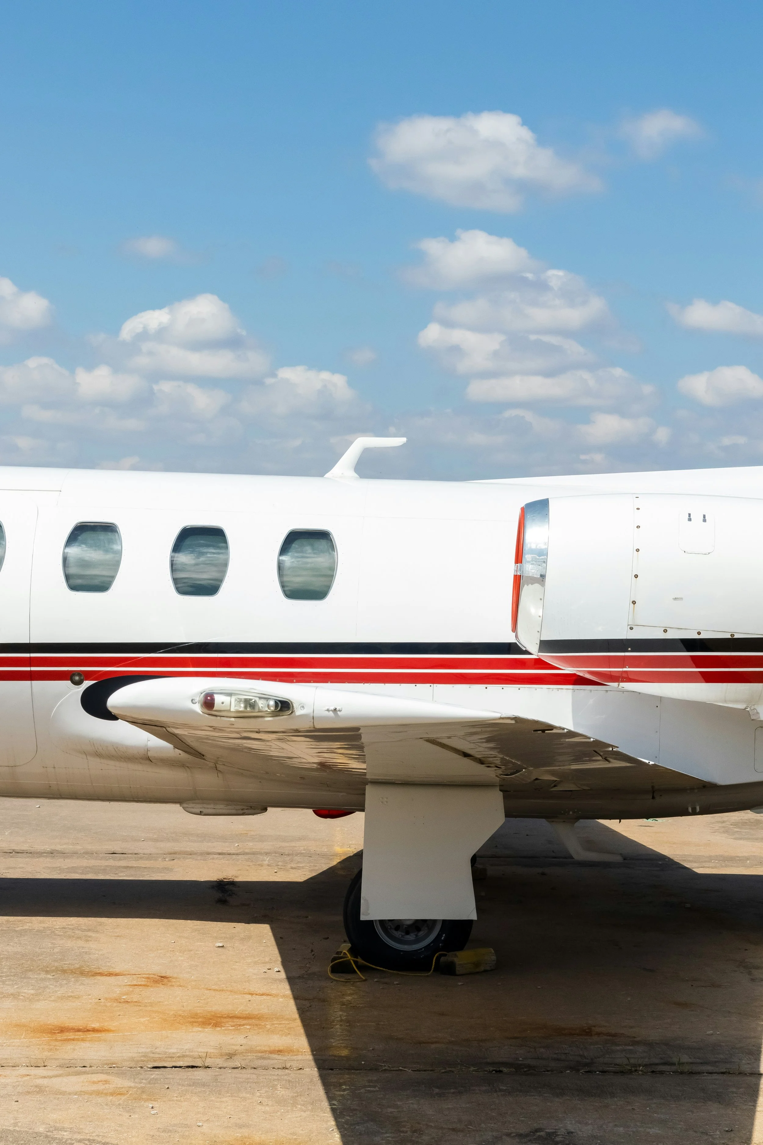 A business aviation aircraft in a maintenance environment.