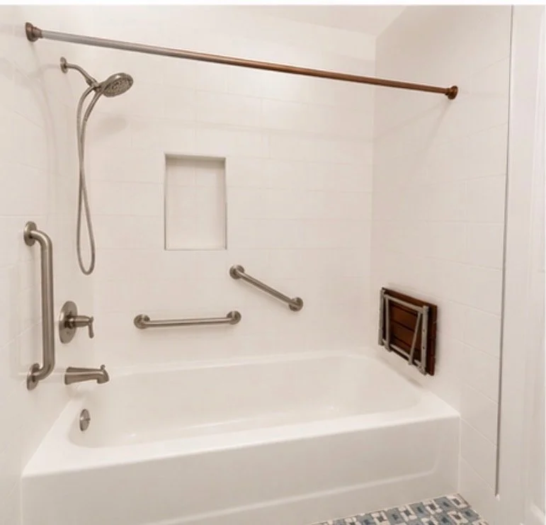 Completed bathroom renovation with custom tile and vanity by True North Builders in Montgomery County PA
